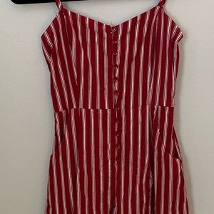 Striped romper in new condition.